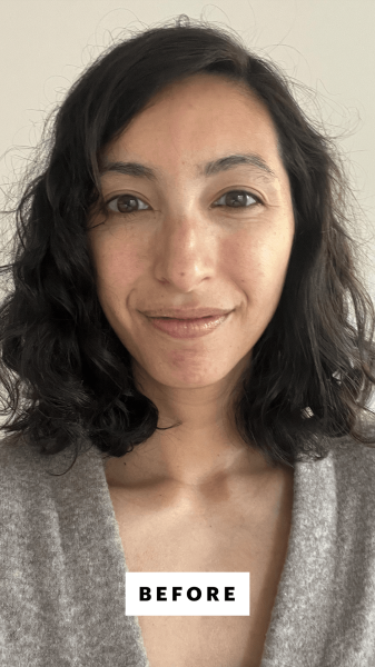 A selfie of Allure contributing commerce editor Deanna Pai before using the Saie The Base Foundation Brush